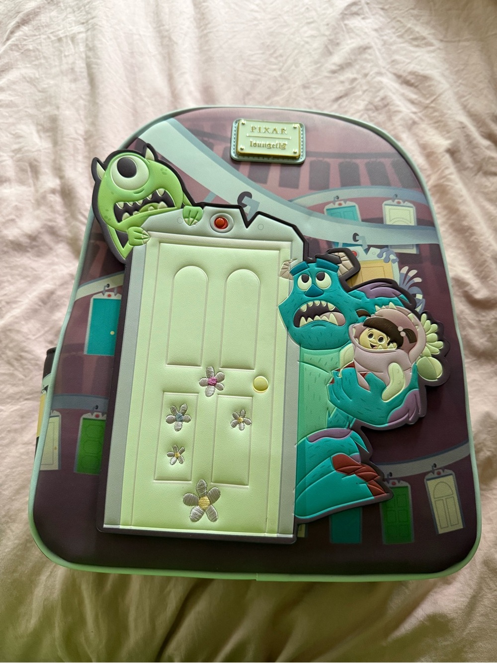 Loungefly Pixar’s Monsters, Inc. Door Scene Backpack